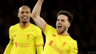 Thomas Partey - Alexandre Lacazette - Ed Osmond - Jota at the double as Liverpool beat Arsenal to reach League Cup final - channelnewsasia.com