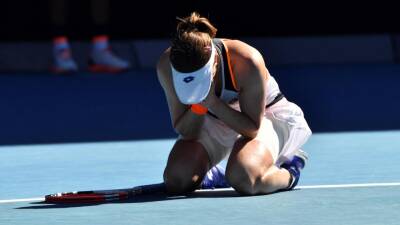 Alize Cornet in tears after she stuns Simona Halep to reach first ever Grand Slam quarter-final at the Australian Open