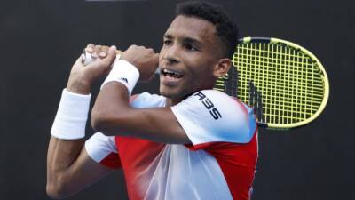 Auger-Aliassime books quarter-final berth