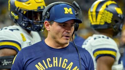 Aidan Hutchinson - Jim Harbaugh - John Harbaugh - Mike Macdonald - Sources - Baltimore Ravens targeting Michigan Wolverines' Mike Macdonald to be new DC - espn.com -  Detroit - state Michigan -  Baltimore - state Ohio