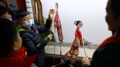 Winter Games - Beijing shadow puppet troupe breaks out shows for Winter Games - channelnewsasia.com - China - Beijing