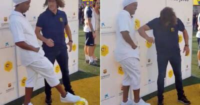 Lionel Messi - Carles Puyol - When Ronaldinho met up with Carles Puyol and couldn’t resist nutmegging his former teammate - msn.com - Brazil -  Paris