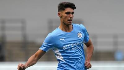 Russell Martin - Cyrus Christie - Hannes Wolf - Andy Fisher - Swansea sign Finley Burns on loan from Manchester City - bt.com - Manchester -  Swansea