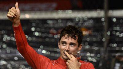 Singapore Grand Prix: Charles Leclerc claims pole for Ferrari, Max Verstappen in eighth for Red Bull