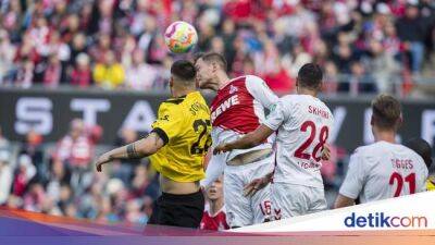 Borussia Dortmund - Jude Bellingham - Julian Brandt - Bundesliga - FC Koln Vs Dortmund: Die Borussen Tumbang 2-3 - sport.detik.com