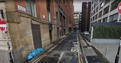 Police hunt family of man 'found unresponsive' in city centre street