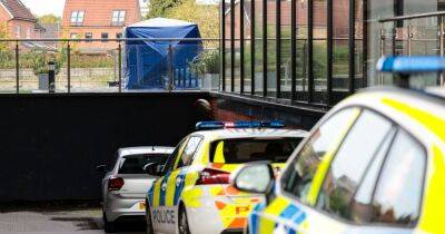 BREAKING: Police tent in place and forensics at scene near flats after 'man found dead' - latest updates