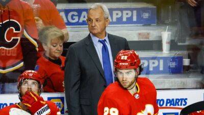 Sutter says Flames won't name a captain to start season