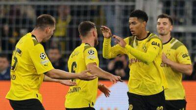 Dortmund draw 1-1 with Sevilla, Manchester City go through