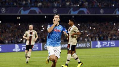 Napoli 4-2 Ajax: Serie A side hit four past Dutch champions to make it through to knockout stages of Champions League