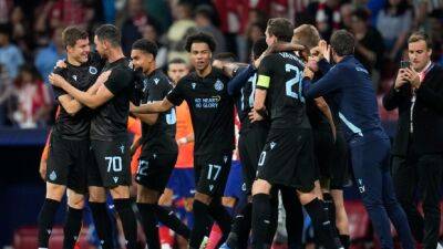 Brugge draws with Atlético, advances in Champions League