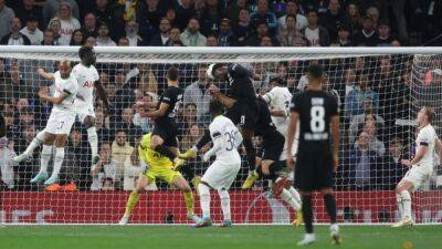 Spurs edge towards last 16 with 3-2 win over 10-man Frankfurt