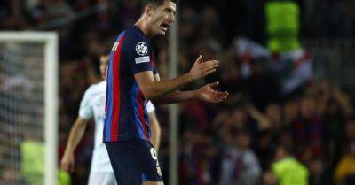 Robert Lewandowski scores late equaliser to give Barcelona Champions League hope