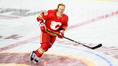 Eakin signs in Switzerland after PTO with Flames
