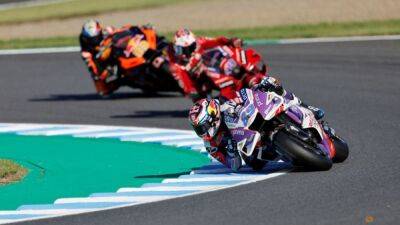 Motorcycling-Martin sets lap record to grab pole position in Australia