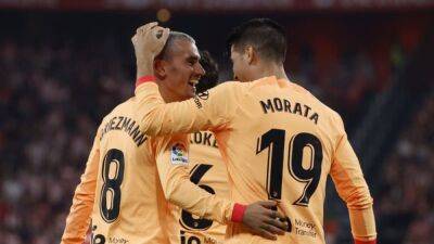 Soccer-Griezmann strike sees Atletico leapfrog Bilbao into third