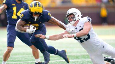 Michigan overwhelms Penn State after halftime altercation