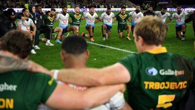 Australian, Fijian rugby players join in emotional prayers and hymns after rousing match