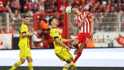 Gregor Kobel - Soccer-Union outclass Dortmund with Haberer double to open up five-point lead - channelnewsasia.com - county Union