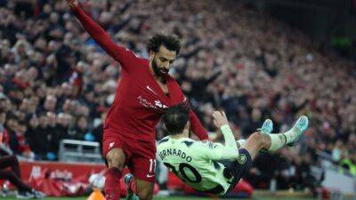 Soccer-Super Salah ignites Liverpool season as Man City lose for first time