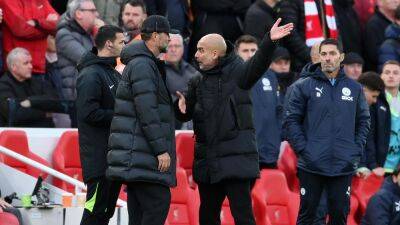 Manchester City boss Pep Guardiola says he was targeted by objects during fiery Liverpool clash