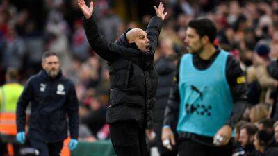 Pep Guardiola says coins were thrown at him during Manchester City's loss to Liverpool