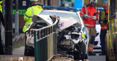 LIVE updates: Oldham road cordoned off after police car slams into barrier in serious crash