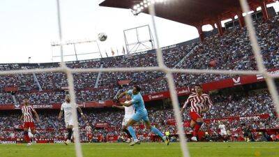 Llorente and Morata score as Atletico sink Sevilla