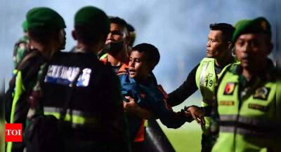 How a deadly crush at an Indonesia football match unfolded
