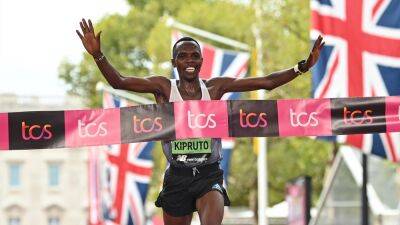 Amos Kipruto takes men's title at London Marathon as Yalemzerf Yehualaw triumphs in women's race