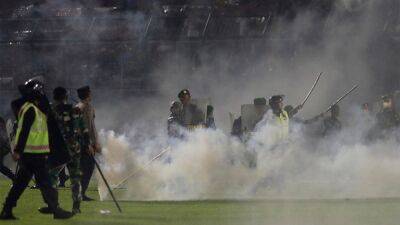 Gianni Infantino - Zainudin Amali - Joko Widodo - Indonesia soccer match chaos seen on video, stampede death toll at 125 - foxnews.com - Russia - Indonesia - Burma