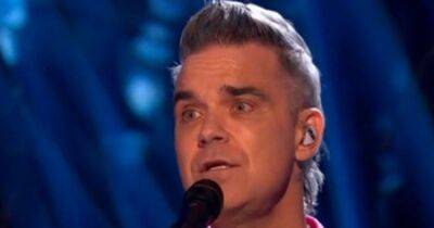 Robbie Williams - Shirley Ballas - BBC Strictly fans spot same thing about Robbie Williams' bold pink suit as they ask questions about new mullet hair - manchestereveningnews.co.uk