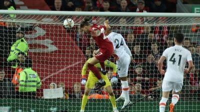 Soccer-Nunez earns points for Liverpool, Man Utd outclass Tottenham