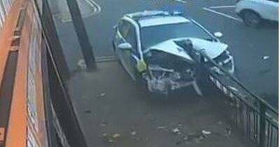 A.Greater - CCTV captures terrifying moment police car ploughs into metal barrier in horror smash - manchestereveningnews.co.uk - Manchester - county Oldham