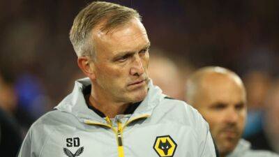 Soccer-Wolves interim manager Davis to stay on until end of year