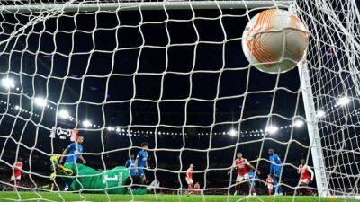 Soccer-Xhaka strike sinks PSV as Arsenal reach Europa League knockout stage