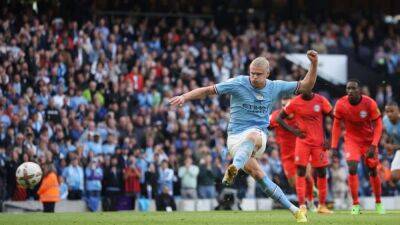 Soccer-Haaland and De Bruyne propel Manchester City past Brighton