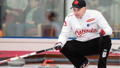 Jean-Michel Menard and his Quebec rink win world mixed curling gold medal