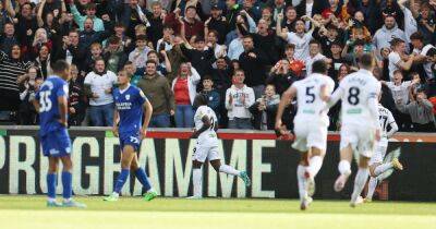 Swansea City 2-0 Cardiff City: Cooper and Obafemi strikes earn hosts victory over 10-man Bluebirds
