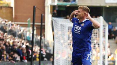 Soccer-Leicester maul Wolves to move out of relegation zone