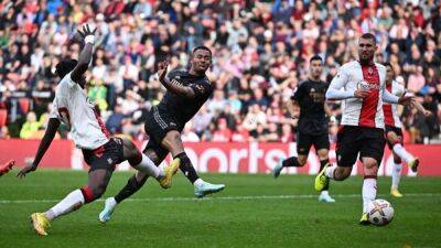 Soccer-Arsenal drop points as Villa move on from Gerrard era in style