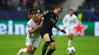 Soccer-Frankfurt back in the mix with 2-1 win over Marseille