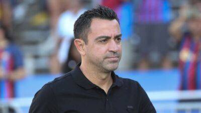 Soccer-Barcelona needed a beating in order to grow, Xavi says