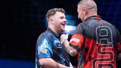 Josh Rock wins at European Championships as defending champion Rob Cross crashes out