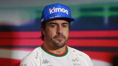 Motor racing-Alonso warns of 'huge problem' if demotion upheld