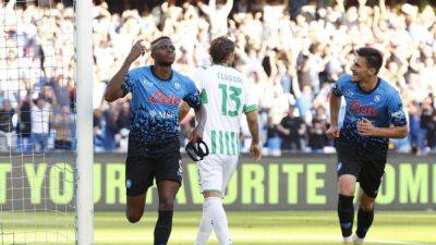 Soccer-Osimhen hits hat-trick as Napoli thrash Sassuolo to keep up unbeaten streak