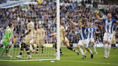 Soccer-De Bruyne sends Man City top, Potter suffers nightmare return to Brighton