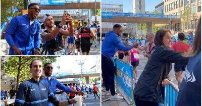 Anthony Joshua and Jill Scott stun London Marathon runners by giving out drinks