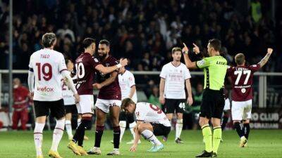 Soccer-Torino upset Milan 2-1 in Serie A