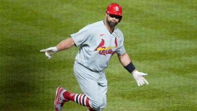 Pujols passes Ruth for second in RBIs, hits 703rd home run